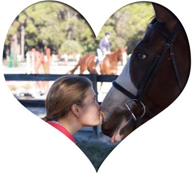 girl kissing a brown and white horse in a heart shaped frame